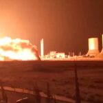 Flames rise at Tishreen thermal power plant following an explosion, near Otaybah