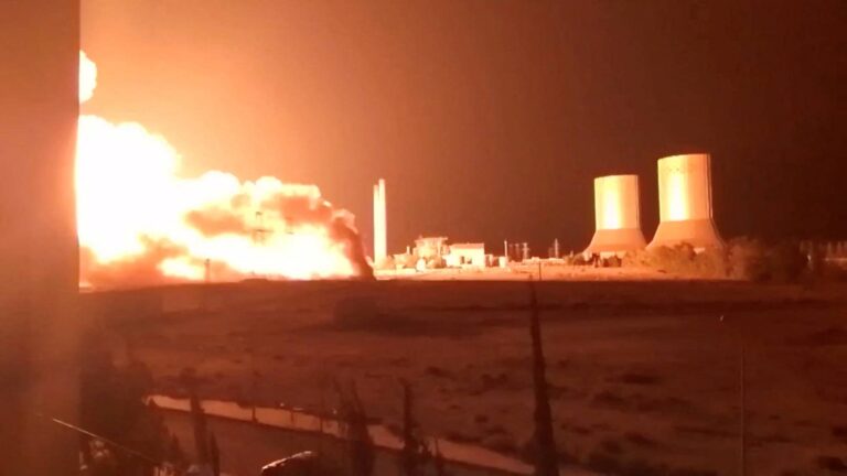 Flames rise at Tishreen thermal power plant following an explosion, near Otaybah